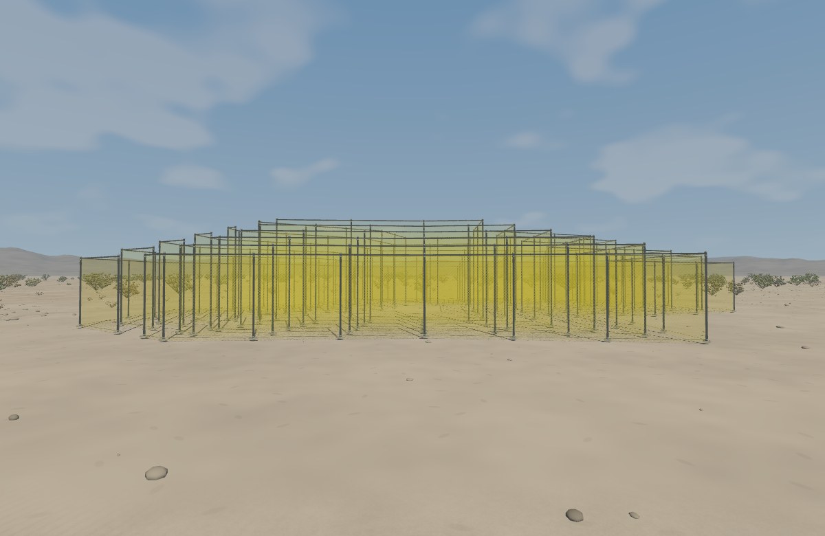 Stepped yellow chain-link walls overlap in a sandy Coachella Valley landscape