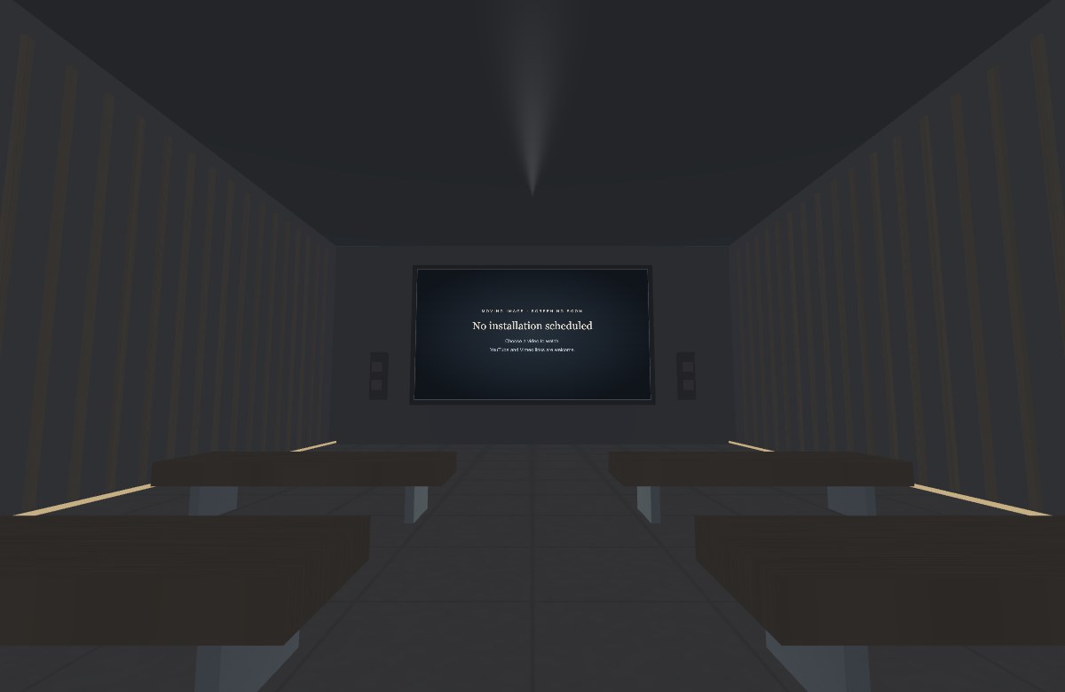 Timber-lined screening gallery with benches facing a luminous front screen